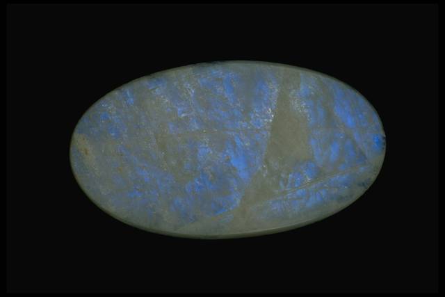 Photograph of a moonstone with blue iridescence (NMNH G3171) from the National Gem Collection
